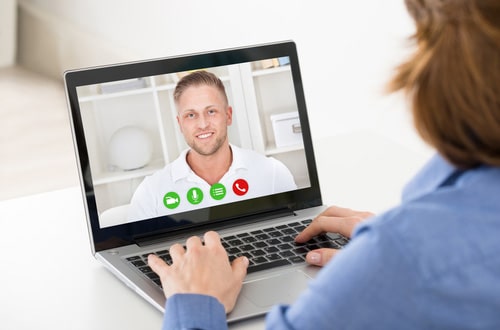 woman having an online psychological therapy session